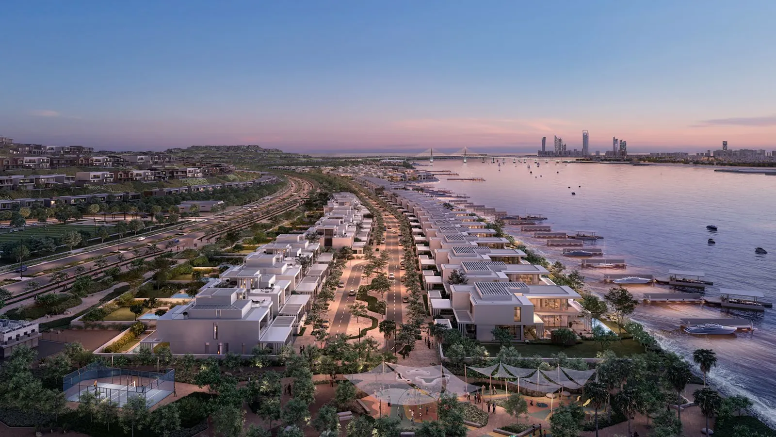 Bashayer on Hudayriyat Island at dusk, with the Abu Dhabi skyline across the water