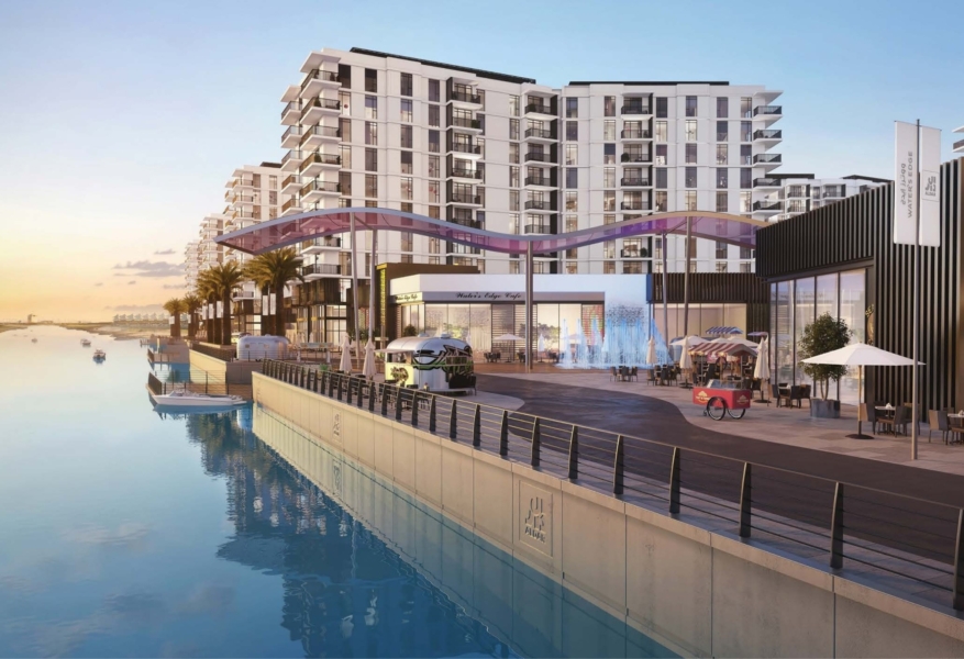 Partial canal and landscaped garden view from balcony of 2-bedroom apartment in Water’s Edge, Yas Island Abu Dhabi