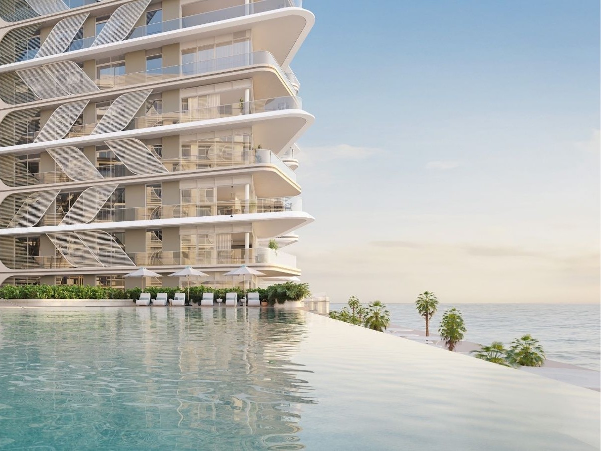 Infinity pool and landscaped gardens at Fahid Island beachfront villas